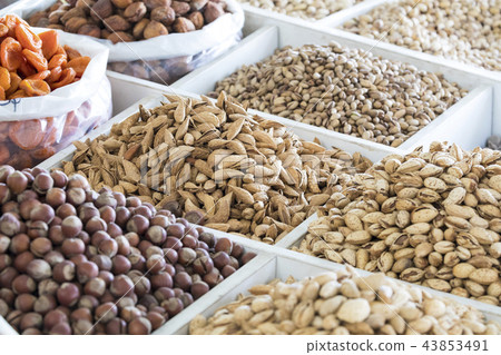 Dried fruits and nuts on local food market Dried fruits and nuts on local food market 43853491