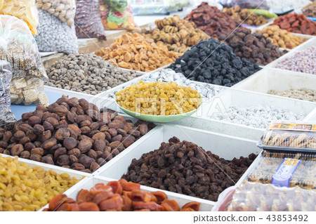 Dried fruits and nuts on local food market 43853492
