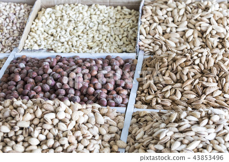 Dried fruits and nuts on local food market 43853496