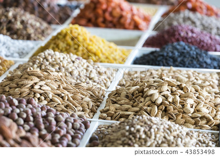 Dried fruits and nuts on local food market Dried fruits and nuts on local food market 43853498