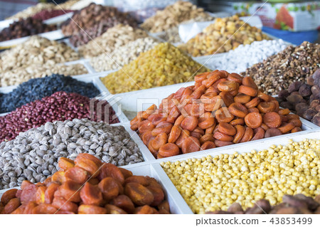 Dried fruits and nuts on local food market 43853499