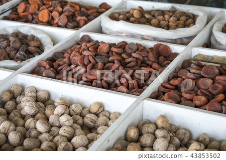 Dried fruits and nuts on local food market Dried fruits and nuts on local food market 43853502