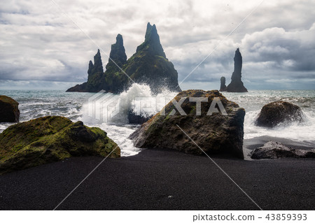 Basalt rock formations Reynisdrangar, Vik, Iceland 43859393