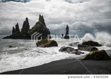 Basalt rock formations Reynisdrangar, Vik, Iceland 43859398