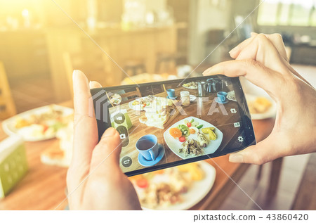 taking photo at breakfast 43860420