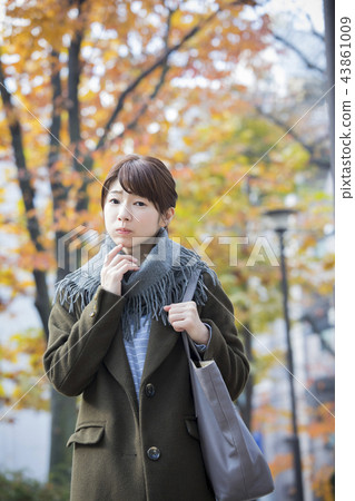 Woman in coat Woman in coat 43861009