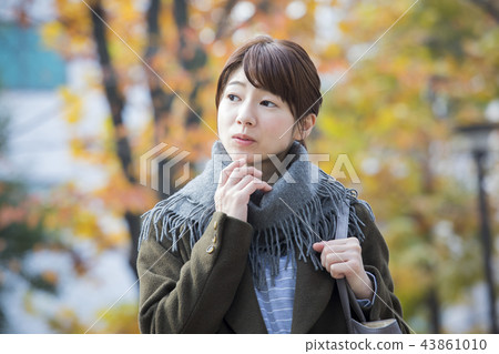 Woman in coat Woman in coat 43861010