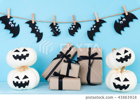White ghost pumpkin with gift box and bat White ghost pumpkin with gift box and bat 43863918