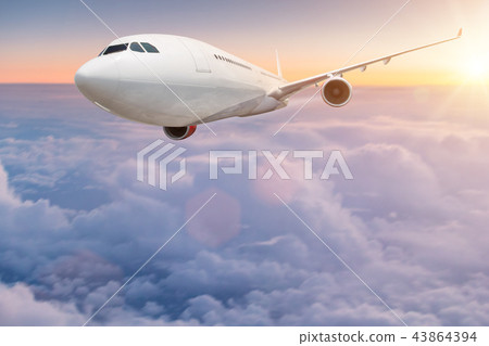 Commercial airplane flying above clouds. Commercial airplane flying above clouds. 43864394