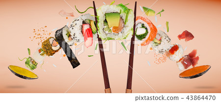 Pieces of delicious japanese sushi frozen in the air. 43864470