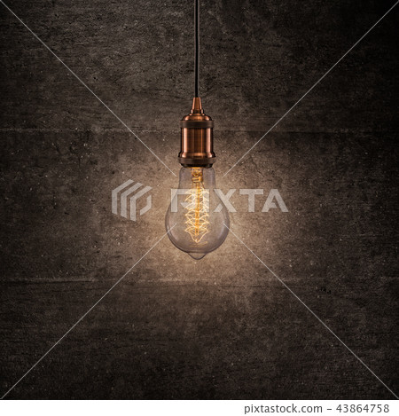 Vintage light bulb on dark background. 43864758