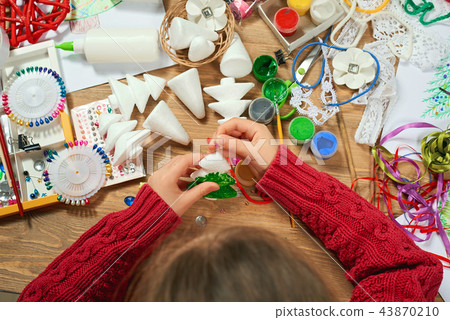 Childrens making decorations for new year holiday 43870210