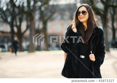 girl walking aroung the streets and the city of Paris girl walking aroung the streets and the city of Paris 43871527