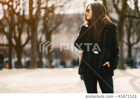 girl walking aroung the streets and the city of Paris girl walking aroung the streets and the city of Paris 43871528
