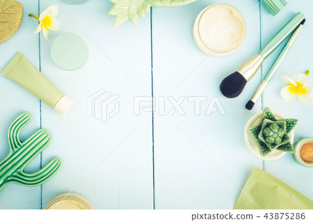Beauty background with facial cosmetic products 43875286