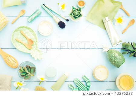 Beauty background with facial cosmetic products Beauty background with facial cosmetic products 43875287
