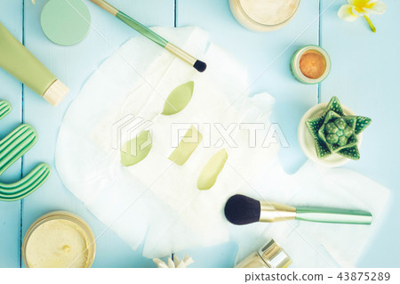 Beauty background with facial cosmetic products Beauty background with facial cosmetic products 43875289
