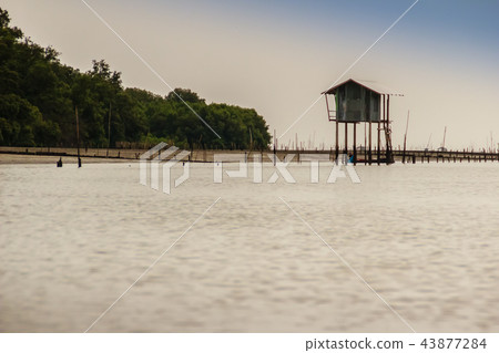 Hut in the sea that used for the owner to stay 43877284