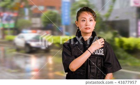 Asian American Woman Police Officer at Crime scene 43877957