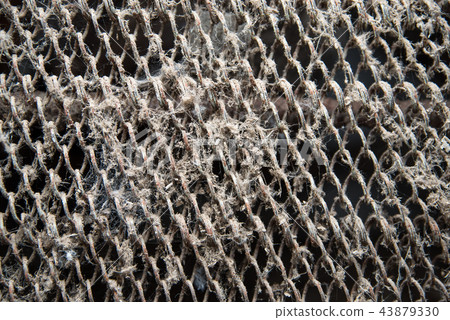 Dirty rusty steel grid with dust and cobwebs, grunge background Dirty rusty steel grid with dust and cobwebs, grunge background 43879330