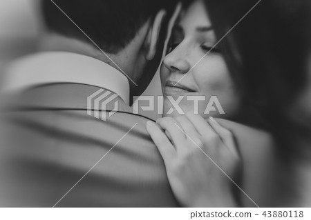 black and white photo of young happy bride 43880118
