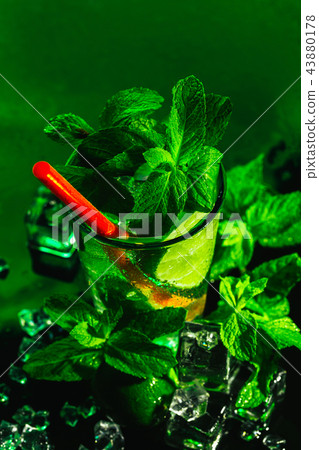 glass of mojito with lime and mint ice cube glass of mojito with lime and mint ice cube 43880178