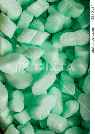pieces of green styrofoam in carton box background pieces of green styrofoam in carton box background 43880184