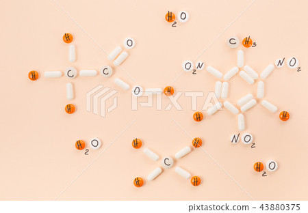 Several formulas of organic chemistry of their white and orange tablets and pills. 43880375