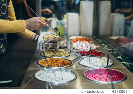 table with different cold snacks, a buffet table with different cold snacks, a buffet 43880654