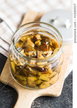 Pickled mushrooms. Marinated boletus. 43880937