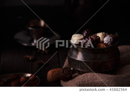 Delicious chocolate pralines. Delicious chocolate pralines. 43882564