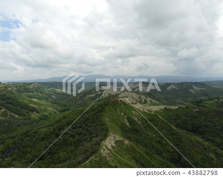 Landscape of the surrounding mountains from Civita di Bagnoregio Landscape of the surrounding mountains from Civita di Bagnoregio 43882798