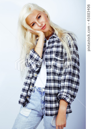 young pretty stylish blond hipster girl posing emotional isolate 43883406