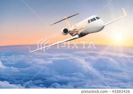 Commercial airplane flying above clouds. Commercial airplane flying above clouds. 43883426