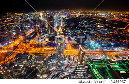 Dubai skyline during night with amazing city center lights and Sheikh Zayed road traffic,United Arab Emirates. 43883987