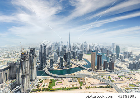 Aerial view of modern city skyscrapers in Dubai, UAE. 43883993