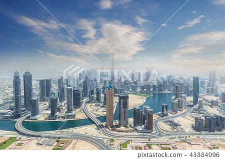 Aerial view of modern city skyscrapers in Dubai, UAE. 43884096