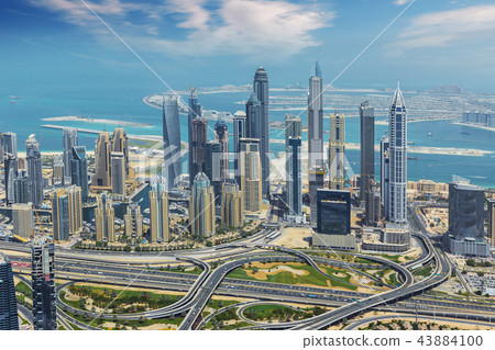 Aerial view of modern city skyscrapers in Dubai, UAE. 43884100