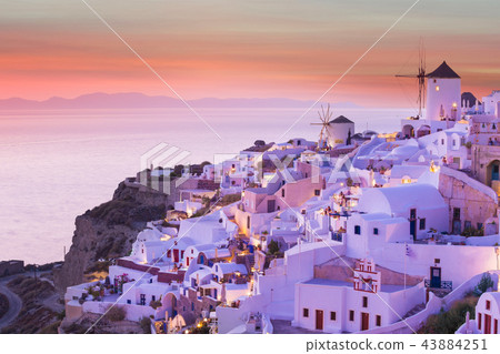 The famous sunset at Santorini in Oia village The famous sunset at Santorini in Oia village 43884251