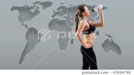 Athletic exercise woman with world map drinking water 43884798