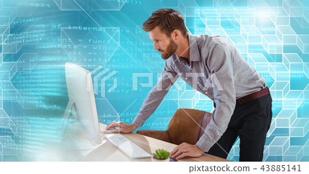 Man using computer with geometric code transition Man using computer with geometric code transition 43885141