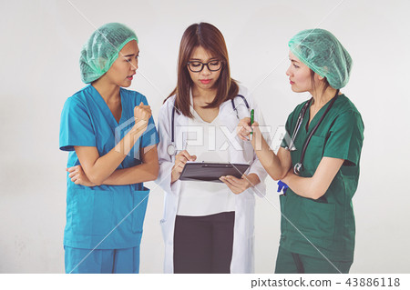 doctor and nurse checking patient information doctor and nurse checking patient information 43886118