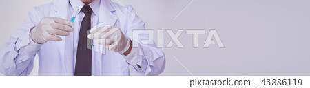 young man scientist in chemistry lab 43886119