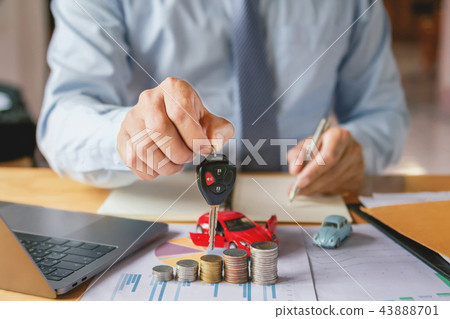 car dealer hand holding key concept car insurance car dealer hand holding key concept car insurance 43888701