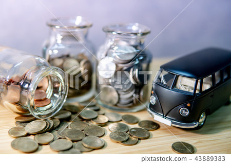 Saving money for car buying. Auto loan concept Saving money for car buying. Auto loan concept 43889383