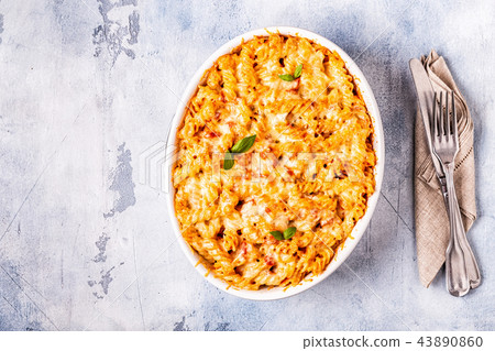 Mac and cheese, pasta baked with cheese sauce. 43890860
