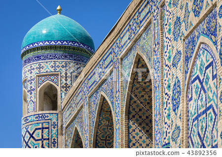 Madrasa facade in Bukhara, Uzbekistan. 43892356