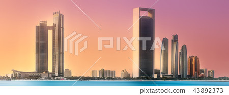 View of Abu Dhabi Skyline at sunrise, UAE 43892373