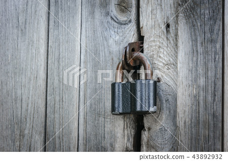 Old lock on the door. lock on the door of an old farmhouse . true village style Old lock on the door. lock on the door of an old farmhouse . true village style 43892932