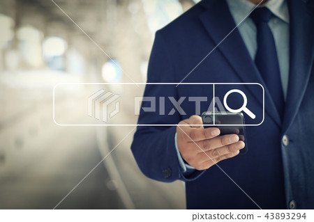 Businessman using Searching Browsing Internet Businessman using Searching Browsing Internet 43893294